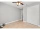 Bedroom featuring tile flooring, closet with sliding doors, and bright window at 1346 Palo Alto Ct, Winter Springs, FL 32708