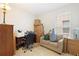 Bright office space featuring a desk, chair, and natural light from the window at 1400 Holly Glen Run, Apopka, FL 32703