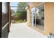 Enclosed patio area with a view of the backyard and outdoor greenery at 1400 Holly Glen Run, Apopka, FL 32703