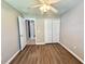 Open bedroom floorplan with closet, neutral wall color, and doorway to the bathroom at 14715 Buckingham Gate Ct, Orlando, FL 32828