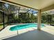 Enclosed pool and patio area is perfect for escaping the Florida heat at 14715 Buckingham Gate Ct, Orlando, FL 32828