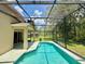 The screened in lanai houses a beautiful pool, perfect for outdoor fun at 14715 Buckingham Gate Ct, Orlando, FL 32828
