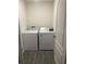 Functional laundry room featuring a washer and dryer, offering convenience for everyday chores at 1635 Wynford Cir, Tavares, FL 32778
