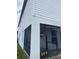 Back patio with a screen enclosure, perfect for outdoor relaxation and enjoying the surrounding view at 1635 Wynford Cir, Tavares, FL 32778