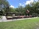The Bocce Ball court, complete with an American flag, is just one of the amenities found in this community at 164 Royal Palm Dr, Leesburg, FL 34748