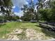 Expansive community lot with a variety of storage and parking options, ideal for outdoor enthusiasts at 164 Royal Palm Dr, Leesburg, FL 34748