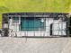 Aerial view of screened pool and patio area, showcasing the layout and design of the outdoor space at 17290 Hickory Wind Dr, Clermont, FL 34711