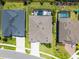 Aerial shot of homes showing yards and pool, perfect for visualizing neighborhood layout and amenities at 17290 Hickory Wind Dr, Clermont, FL 34711