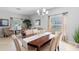 Open-concept living space blending living and dining areas, featuring cozy seating and abundant natural light at 1785 Rushden Dr, Ocoee, FL 34761