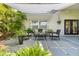 Charming patio with paved stone and an outdoor seating area perfect for relaxation at 1785 Rushden Dr, Ocoee, FL 34761