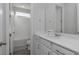 Bright bathroom featuring white vanity, modern fixtures, and tiled shower/tub combination at 1811 Caribbean View Ter, Kissimmee, FL 34747