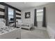 Cozy bedroom with Mickey Mouse theme, black and white striped wall, and comfortable twin beds at 1811 Caribbean View Ter, Kissimmee, FL 34747