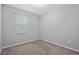 Bedroom with carpet and a window that provides natural light at 1841 Overcup Ave, St Cloud, FL 34769
