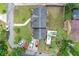 Aerial view of home showcasing well-maintained grounds, driveway and ample parking at 201 Garden Ln, Longwood, FL 32750