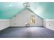 Attic boasts vaulted turquoise ceilings, offering a unique and spacious bonus area at 201 Garden Ln, Longwood, FL 32750