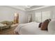 Bright bedroom featuring wood floors, a ceiling fan, and shuttered windows at 2036 Brink Aly, Orlando, FL 32814