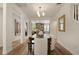 Elegant dining room with modern lighting, hardwood floors, and an inviting open layout at 2036 Brink Aly, Orlando, FL 32814