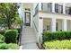 Inviting entrance to a home featuring a classic door and well-manicured landscaping at 2036 Brink Aly, Orlando, FL 32814