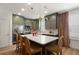 Updated kitchen features stainless steel appliances, a large island, and custom cabinets at 2036 Brink Aly, Orlando, FL 32814
