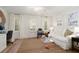 Bright living room featuring ample natural light, hardwood floors, and stylish decor at 2036 Brink Aly, Orlando, FL 32814