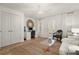 Bright living room featuring ample natural light, hardwood floors, and stylish decor at 2036 Brink Aly, Orlando, FL 32814