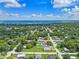 Aerial view of a neighborhood near a body of water and a sunny day at 205 9Th St, St Cloud, FL 34769