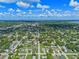Panoramic aerial shot of a community featuring orderly streets, diverse homes, and lush, green surroundings at 205 9Th St, St Cloud, FL 34769