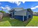 The backyard features a shed, and a fenced in lawn at 205 9Th St, St Cloud, FL 34769