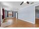 Spacious living room with hardwood floors, ceiling fan and natural light at 205 9Th St, St Cloud, FL 34769
