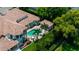 A high aerial shot featuring a pool, backyard cabana, and landscaped grounds of a luxury home at 2211 Azalea Pl, Winter Park, FL 32789
