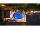 An aerial view of the in-ground pool with attached spa in the backyard of the home at 2211 Azalea Pl, Winter Park, FL 32789