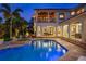 Gorgeous backyard with a luxurious pool, hot tub, and expansive patio, perfect for outdoor relaxation and entertainment at 2211 Azalea Pl, Winter Park, FL 32789