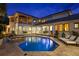 Expansive backyard featuring a large pool, spa, spacious patio, and inviting lounge chairs for ultimate relaxation at 2211 Azalea Pl, Winter Park, FL 32789