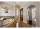 The bathroom features a soaking tub, tiled floor, and an entry to the glass enclosed shower at 2211 Azalea Pl, Winter Park, FL 32789
