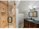 Elegant bathroom featuring a walk-in shower with glass door and granite countertop vanity at 2211 Azalea Pl, Winter Park, FL 32789