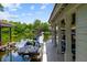 Private boat dock with multiple slips and jet skis on a tranquil waterway at 2211 Azalea Pl, Winter Park, FL 32789