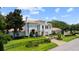Charming home with lush landscaping, wrought iron fencing, and a spacious front yard, blending elegance and comfort at 2211 Azalea Pl, Winter Park, FL 32789