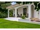Charming front porch with ample seating, perfect for relaxing outdoors at 2211 Azalea Pl, Winter Park, FL 32789