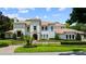 Beautiful two-story home with manicured landscaping, gated entrance, and a timeless Mediterranean design at 2211 Azalea Pl, Winter Park, FL 32789