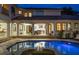 An in-ground pool with an attached spa is centered in the patio outside the home at 2211 Azalea Pl, Winter Park, FL 32789