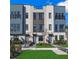 Stylish townhome showcases modern architectural details and appealing landscaping at 2273 Valentine Aly, Orlando, FL 32804