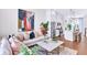 Cozy living area with kitchen view featuring modern furniture and stylish decor at 2273 Valentine Aly, Orlando, FL 32804