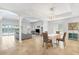 Open-concept living area features abundant natural light and seamless flow to dining and outdoor spaces at 2604 Marble Ave, Orlando, FL 32803