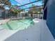 Lush screened-in pool area with a spacious deck, providing a perfect spot for leisure and outdoor enjoyment at 2604 Marble Ave, Orlando, FL 32803