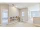 Bright reading nook with carpet flooring with built-in shelving and a miniature chair at 2604 Marble Ave, Orlando, FL 32803