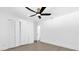 This bedroom has light gray laminate flooring and double closets with white doors at 3 Pine Glen Dr, Debary, FL 32713