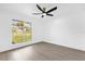 Airy bedroom features recessed lighting and natural light from backyard window at 3 Pine Glen Dr, Debary, FL 32713