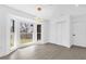 Sun-filled dining room with storage and an elegant chandelier fixture at 3 Pine Glen Dr, Debary, FL 32713