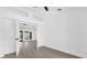 Hallway leads into living room with views of the backyard pool at 3 Pine Glen Dr, Debary, FL 32713