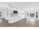Charming kitchen area with sleek, white cabinets, stainless microwave, and natural lighting at 3 Pine Glen Dr, Debary, FL 32713
